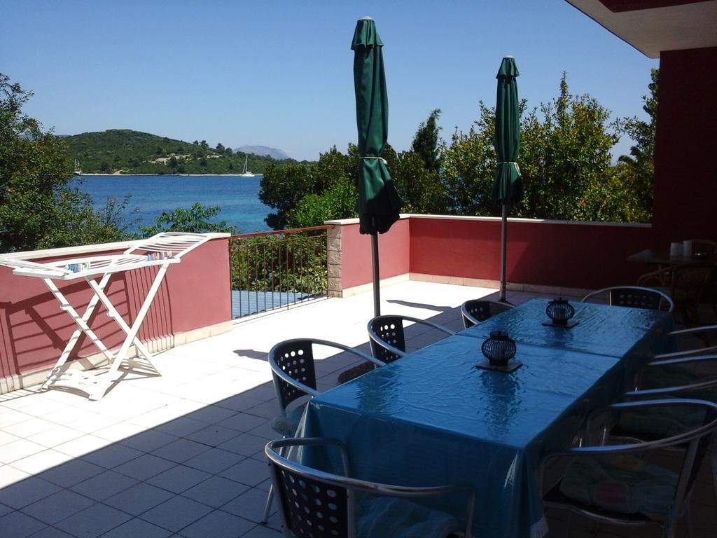 Apartments Tomovic Lumbarda Exterior foto